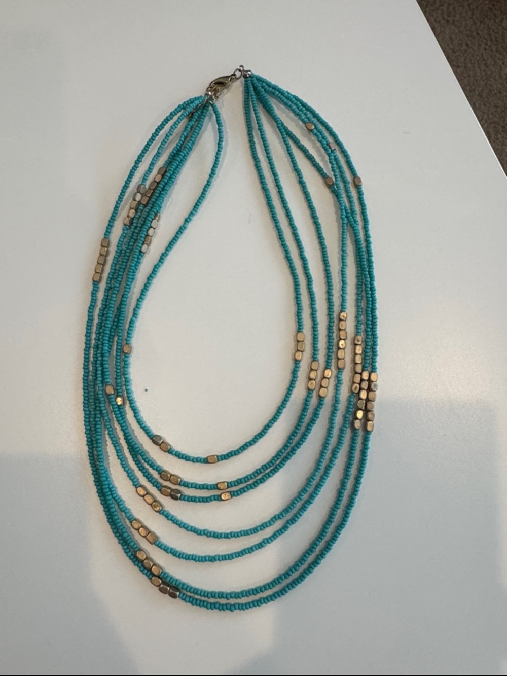 Turquoise Multi-Strand Beaded Necklace with Gold Accents